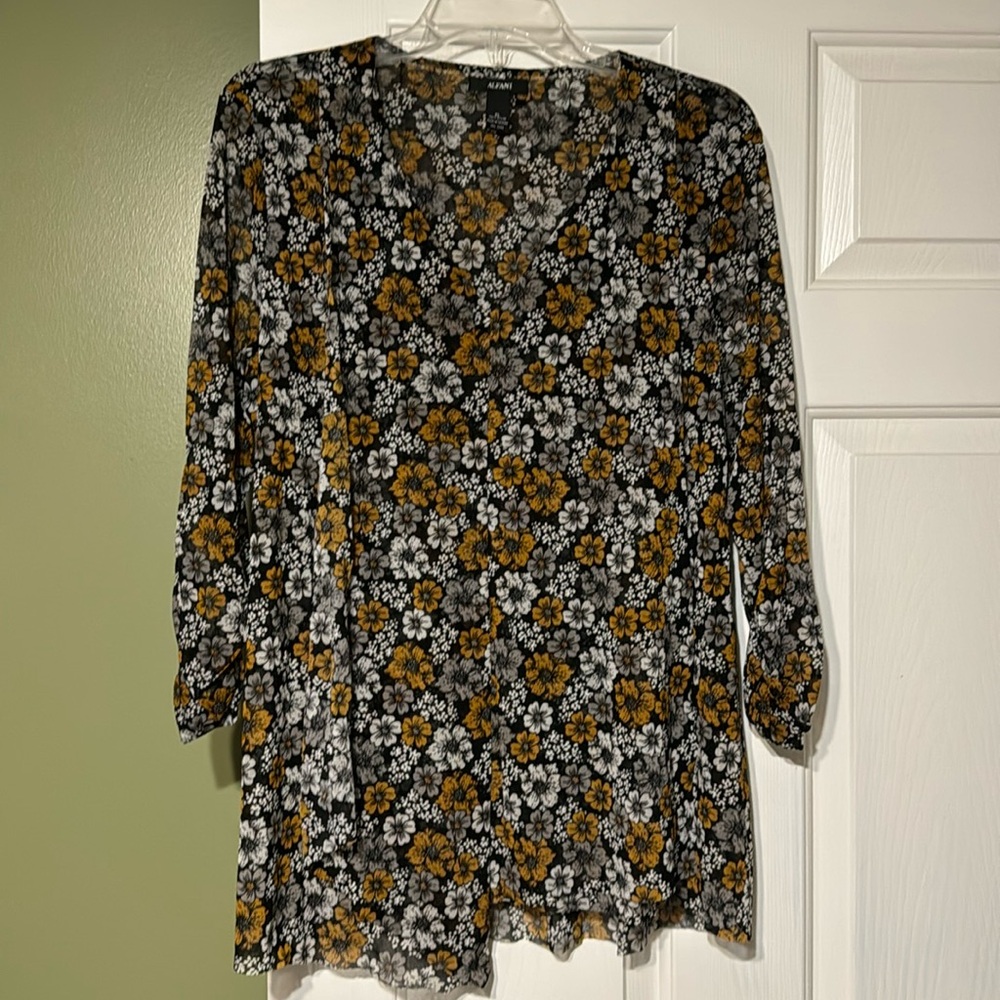 Light weight shirt, three quarter sleeve!  Great for all weather!
